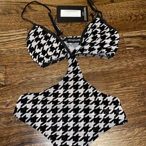 NEW black and white checkered cut out body suit